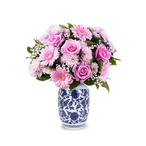 Florero de porcelana con rosas y gerberas. Arreglos Florales Delivery en Lima Perú