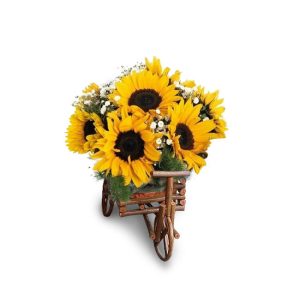 Arreglo de girasoles en carreta